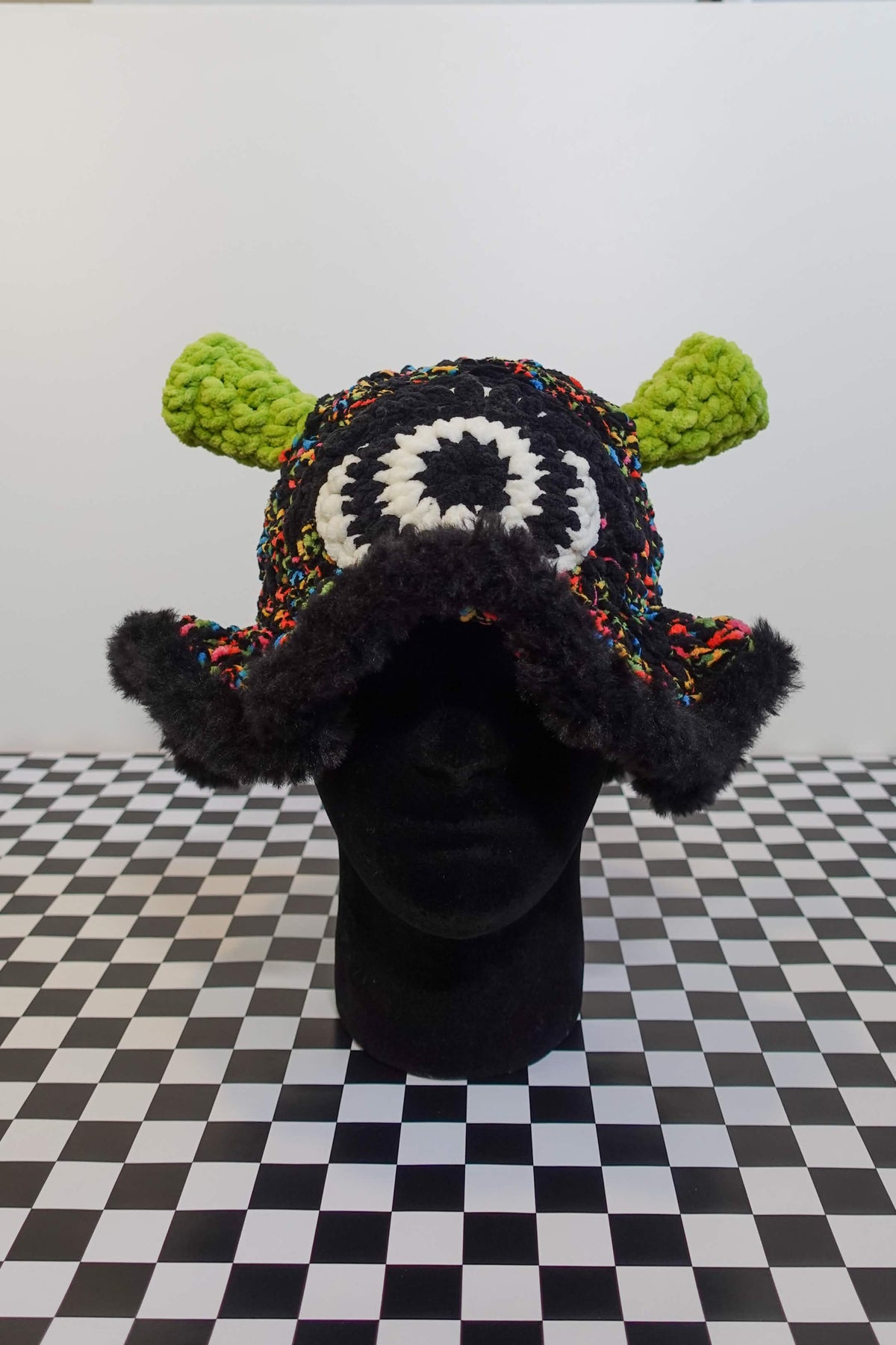 Handmade crochet cyclops bucket hat with plush ears and hidden trinket pocket – Knotty Things