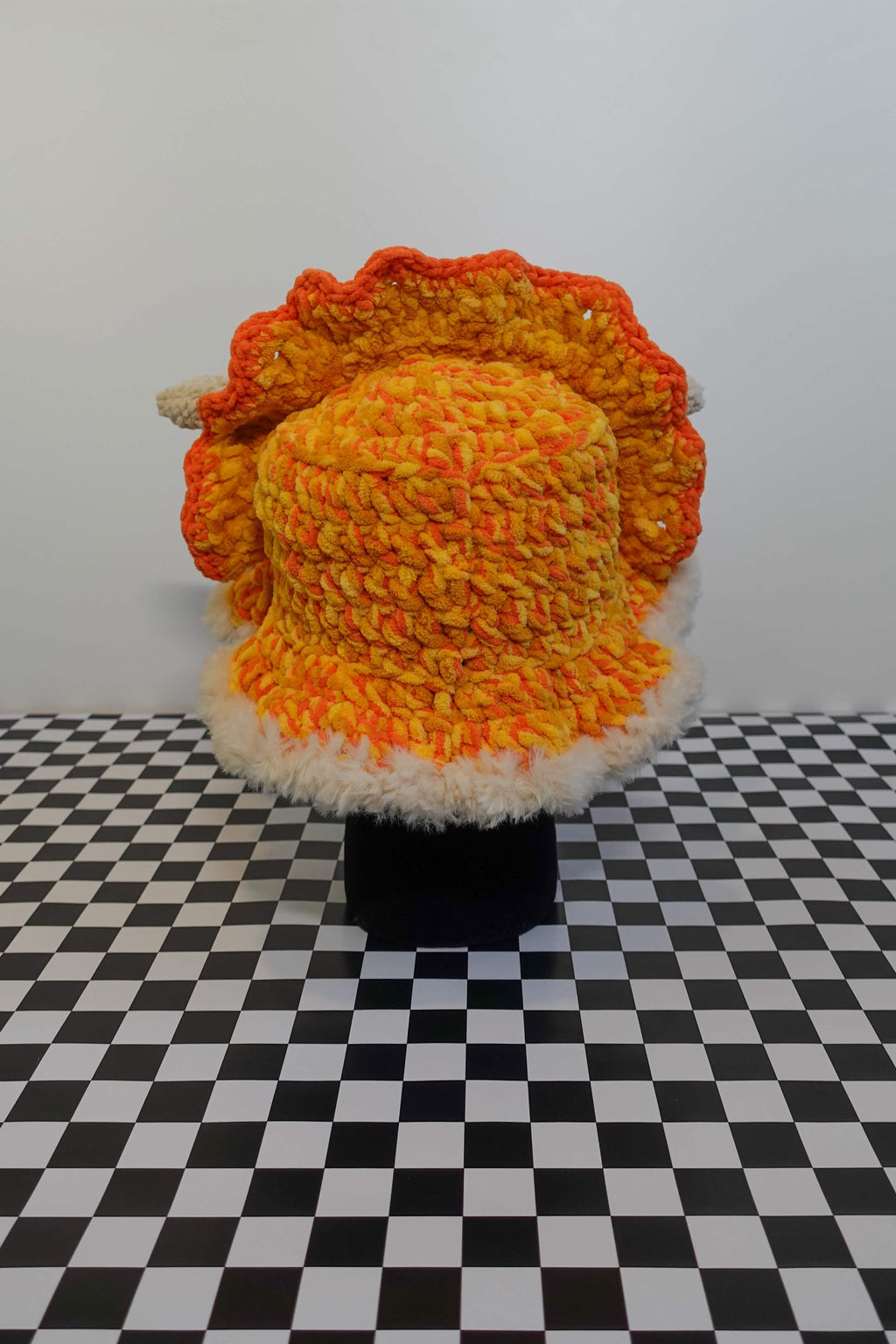 Handmade crochet triceratops bucket hat with plush horns and frill – Knotty Things