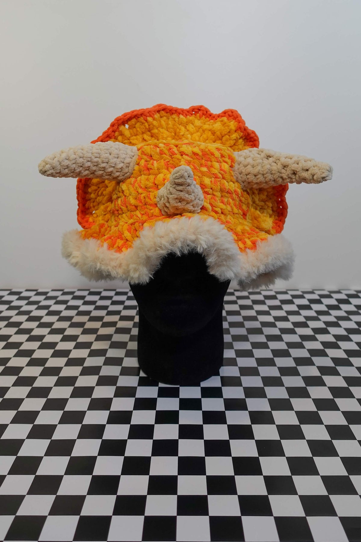 Handmade crochet triceratops bucket hat with plush horns and frill – Knotty Things